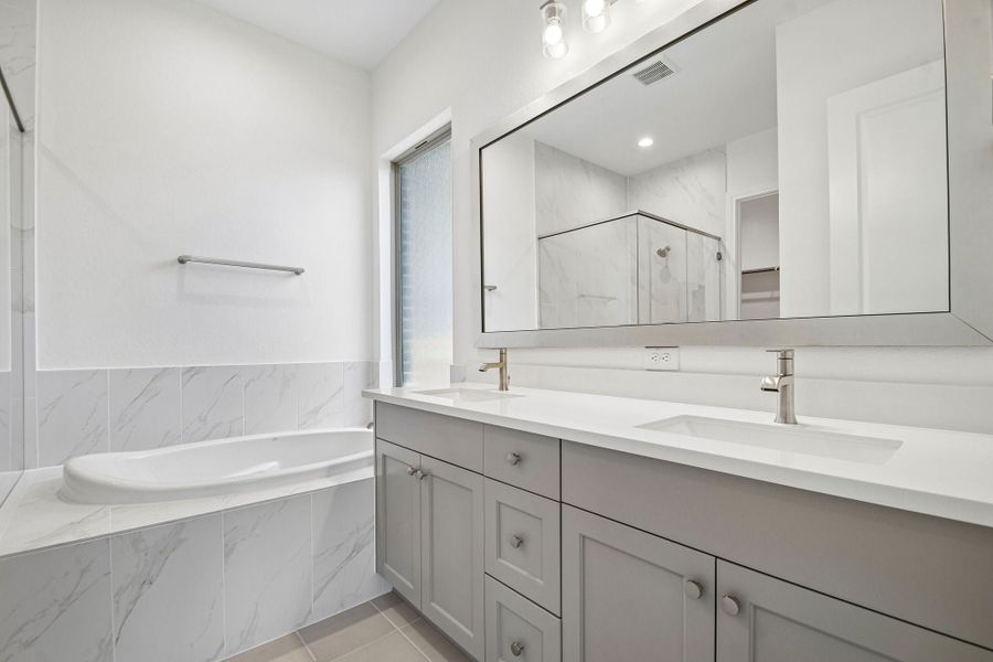 Furnished interior view inside a new home in 6 Creeks, Kyle (Image 8).