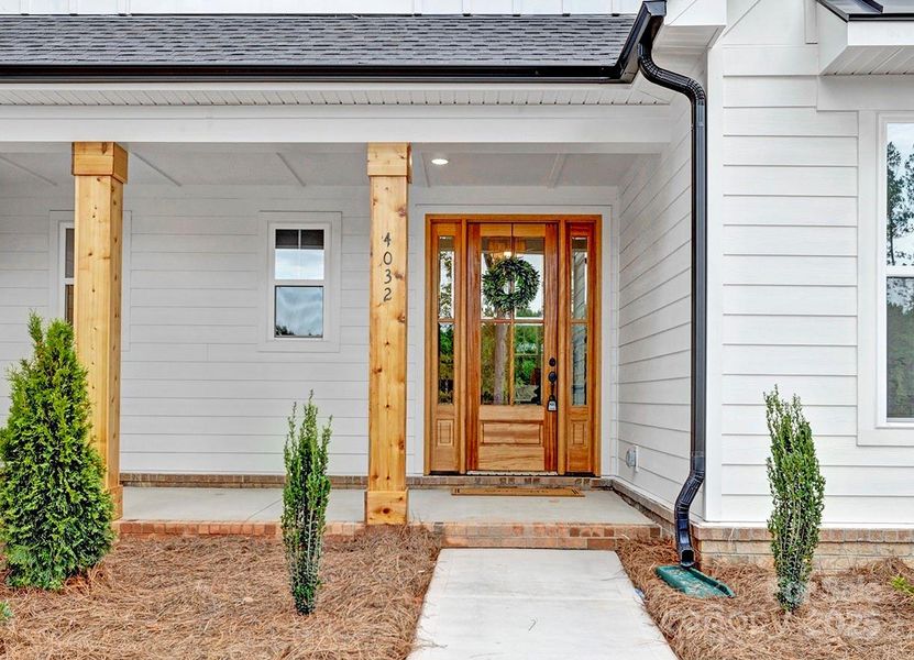 Front exterior of a new home in , Clover, SC, highlighting curb appeal (Image 2). Front exterior of a new home in , Clover, SC, highlighting curb appeal (Image 2).