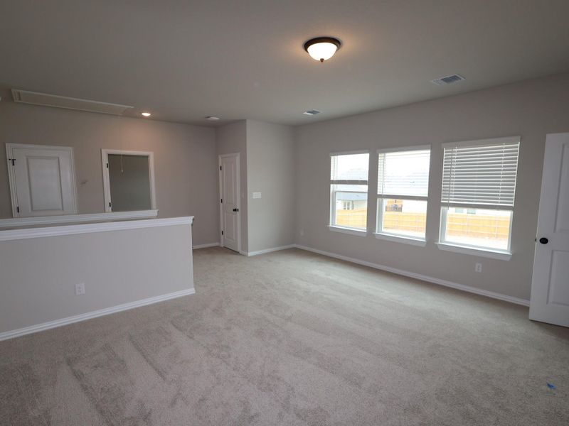Spacious, unfurnished interior of a new home in Heritage, Dripping Springs (Image 11). Spacious, unfurnished interior of a new home in Heritage, Dripping Springs (Image 11).