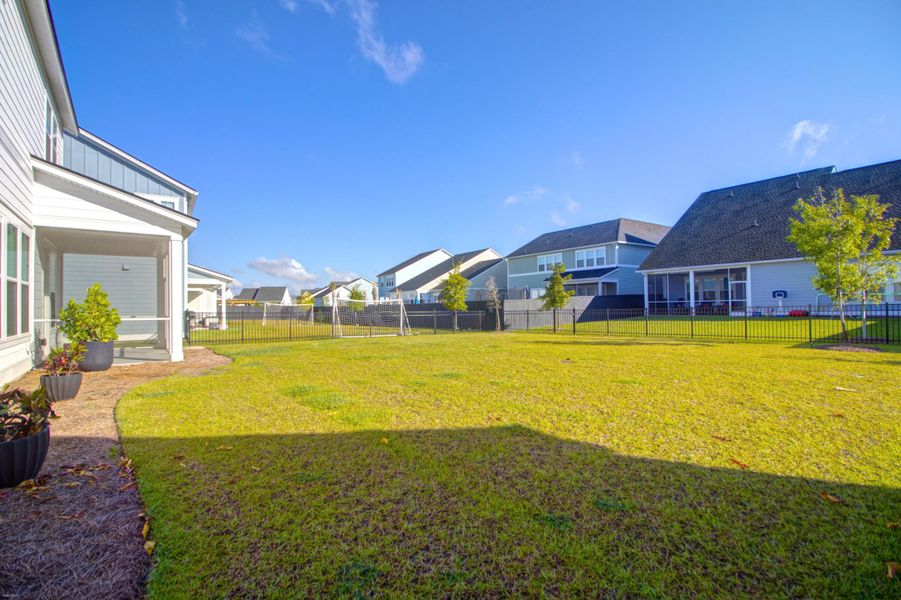 Front exterior of a new home in Carnes Crossroads: Coastal Collection, Summerville, SC, highlighting curb appeal (Image 2).