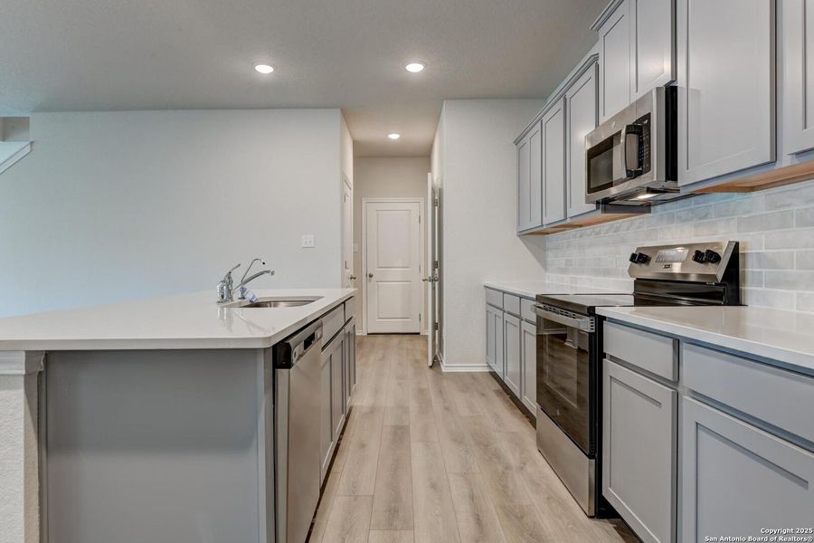 Furnished interior view inside a new home in Meadows at Hennersby Hollow 40's, San Antonio (Image 14).