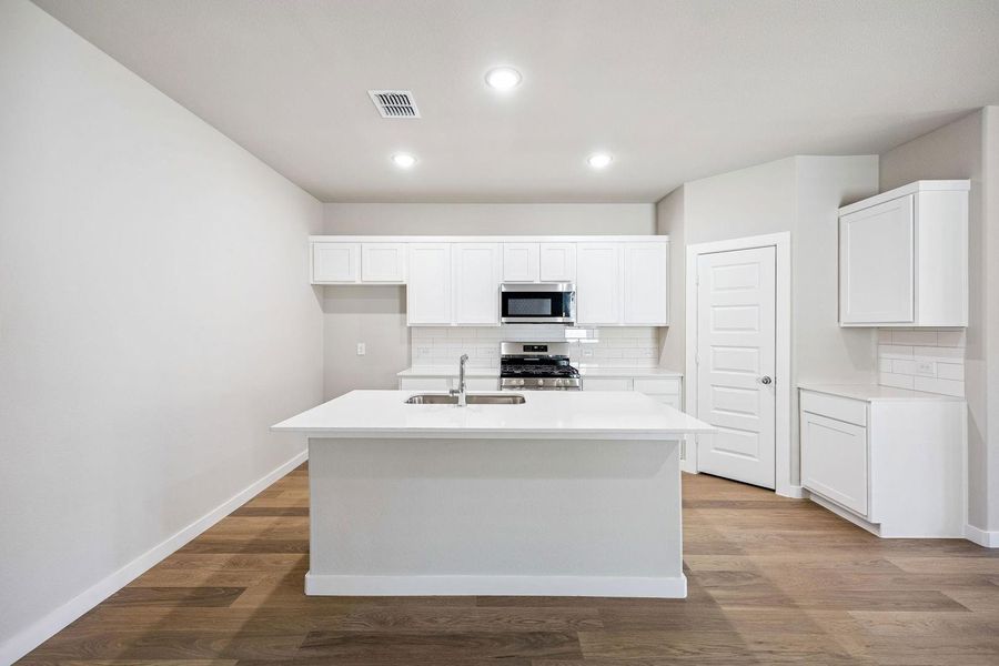 Kitchen in the Willow home plan by Trophy Signature Homes – REPRESENTATIVE PHOTO Kitchen in the Willow home plan by Trophy Signature Homes – REPRESENTATIVE PHOTO