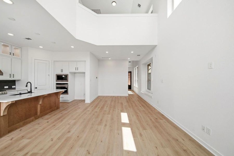 Spacious, unfurnished interior of a new home in Bridgeland, Cypress (Image 14).