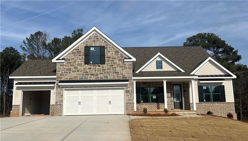 Front exterior of a new home in , Loganville, GA, highlighting curb appeal (Image 2). Front exterior of a new home in , Loganville, GA, highlighting curb appeal (Image 2).