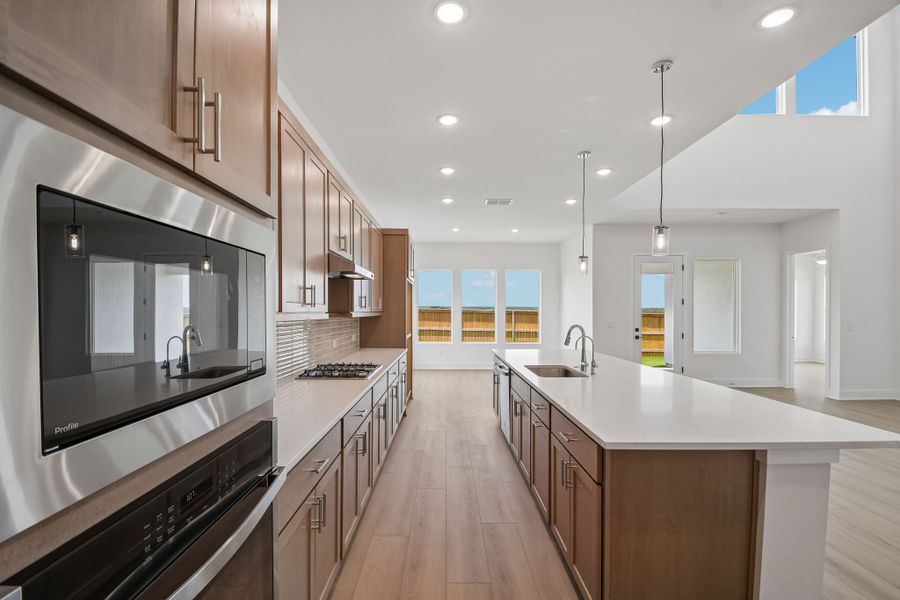 Furnished interior view inside a new home in Freedom at Anthem, Kyle (Image 6).
