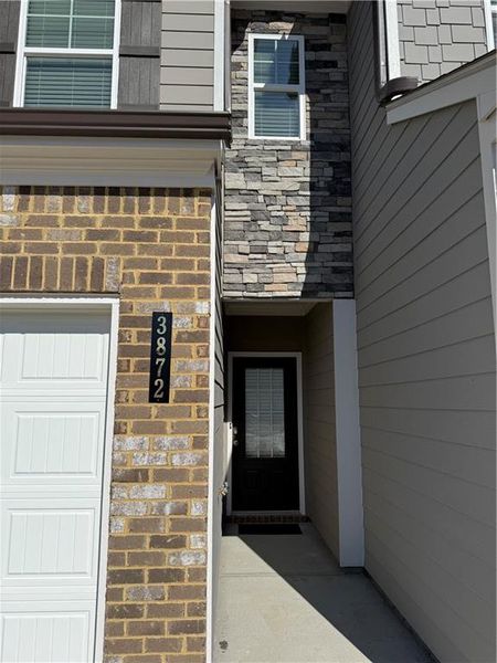 Exterior details and patio area of a home in Somerset at Riverbrook, Gainesville (Image 3). Exterior details and patio area of a home in Somerset at Riverbrook, Gainesville (Image 3).