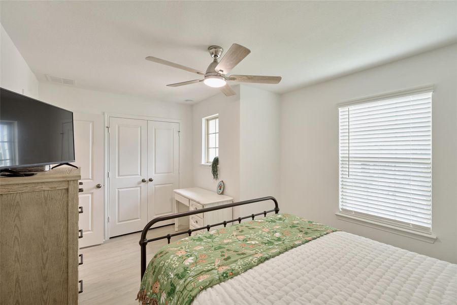 Furnished interior view inside a new home in The Pines At Seven Coves, Willis (Image 31).