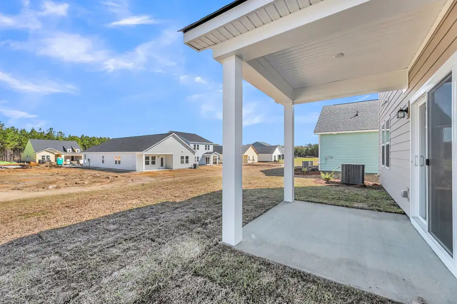Exterior details and patio area of a home in , Ravenel (Image 3).