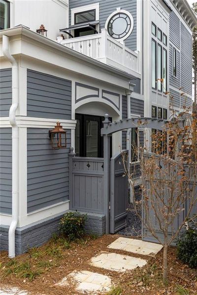 Exterior details and patio area of a home in , Chattahoochee Hills (Image 18).
