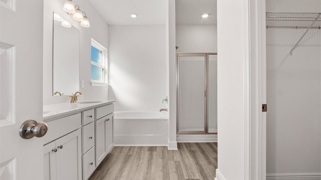 Representative furnished interior of a home built from the Madison by D.R. Horton in Owl's Head Farms, Freeport (Image 15).