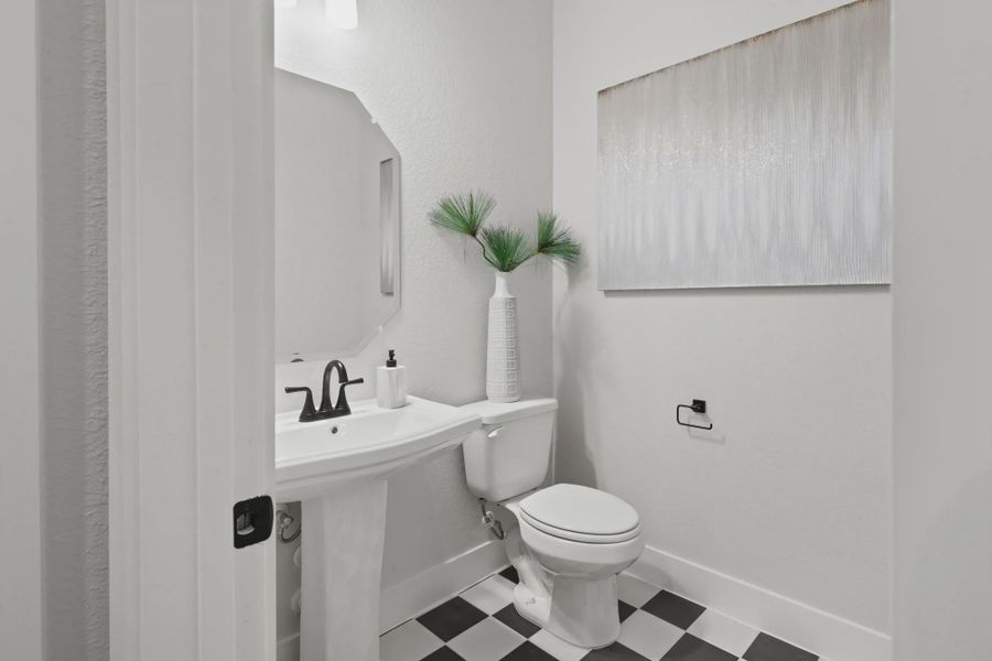 Furnished interior view inside a new home in 6 Creeks, Kyle (Image 7).