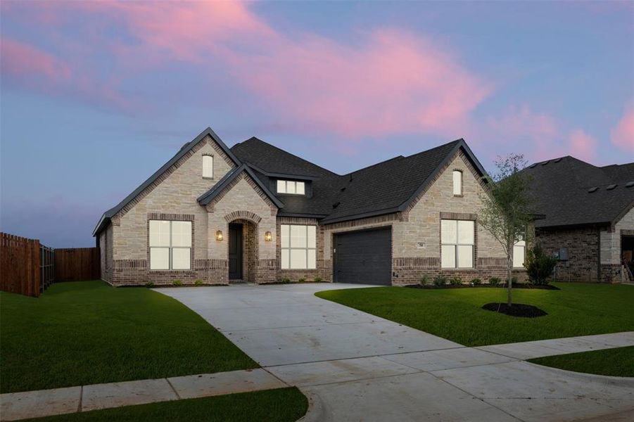 Front exterior of a new home in Mockingbird Hills, Joshua, TX, highlighting curb appeal (Image 16). Front exterior of a new home in Mockingbird Hills, Joshua, TX, highlighting curb appeal (Image 16).