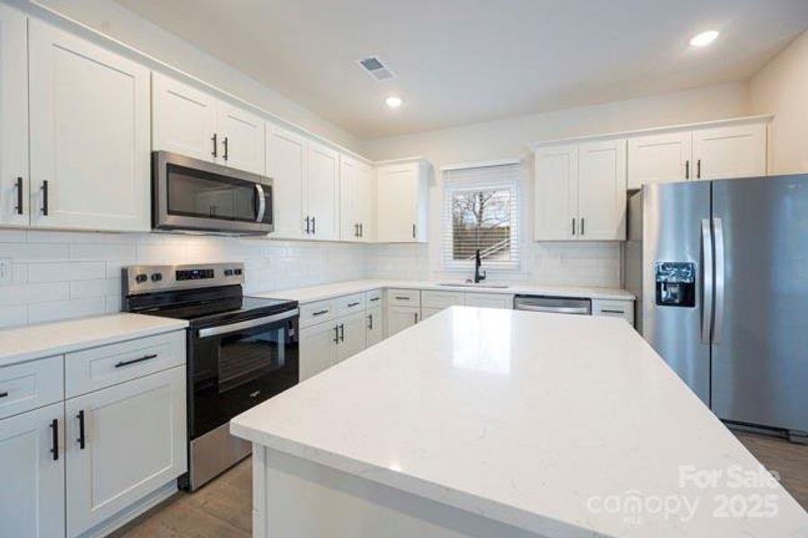 Furnished interior view inside a new home in , Newton (Image 7).