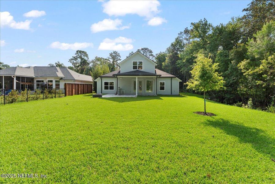 Front exterior of a new home in , Fleming Island, FL, highlighting curb appeal (Image 18).