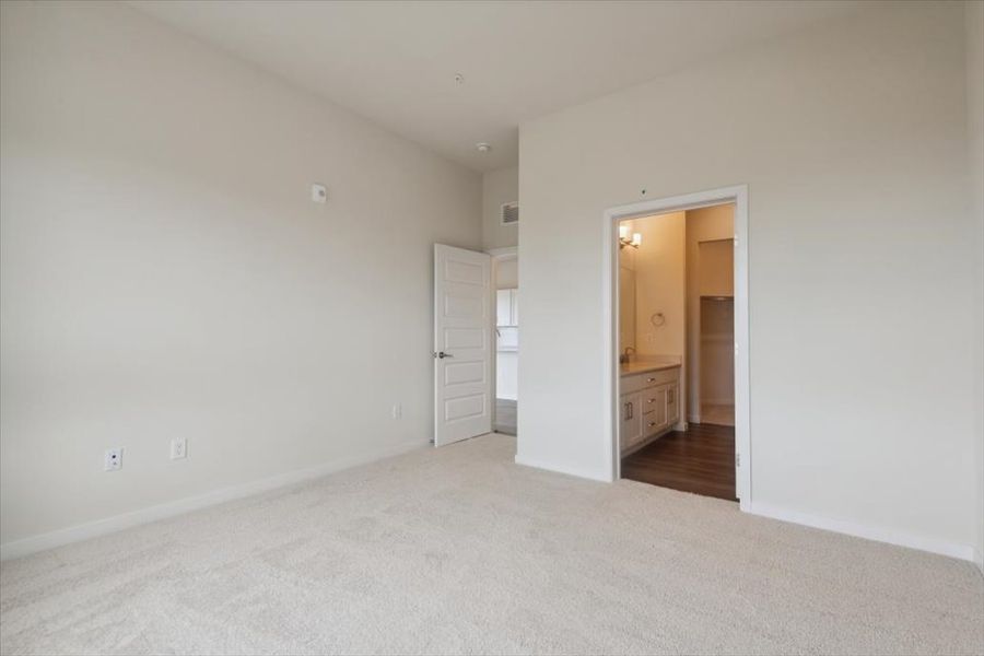 A hallway with white walls. A hallway with white walls.