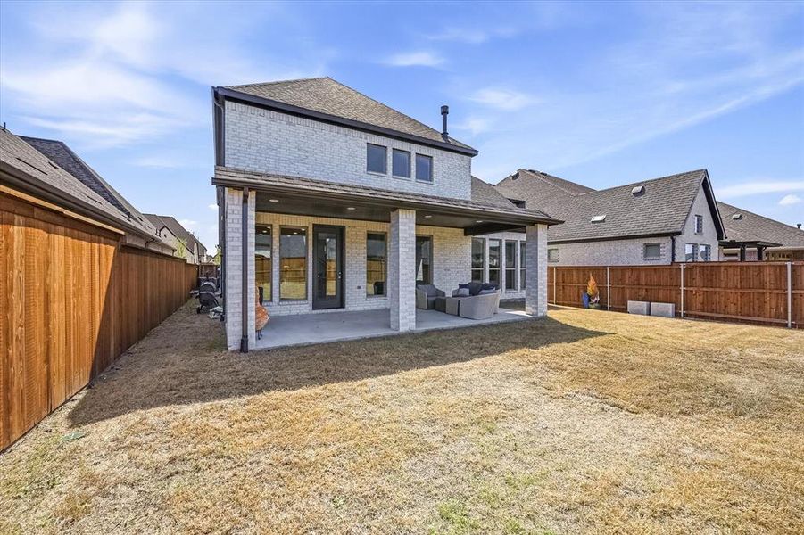 Exterior details and patio area of a home in Mustang Lakes, Celina (Image 25).
