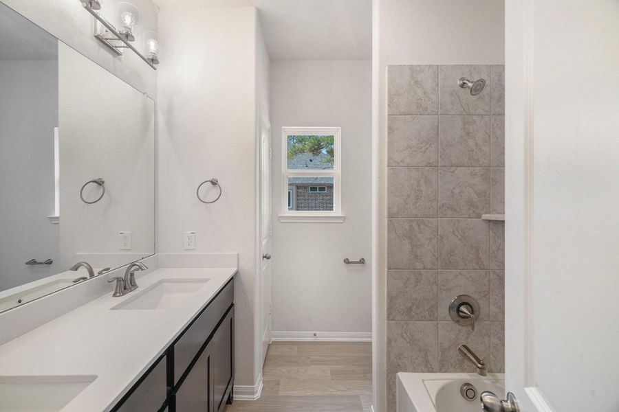 Furnished interior view inside a new home in Deer Pines, Conroe (Image 11).