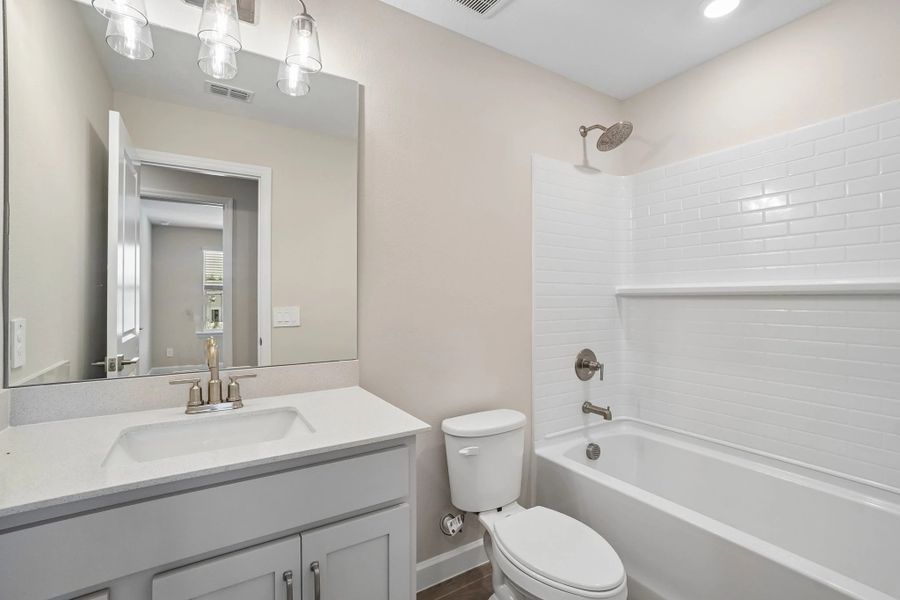 Bathroom 2 located near bedroom 2 and 3 features aspects of AW Collection® Milan