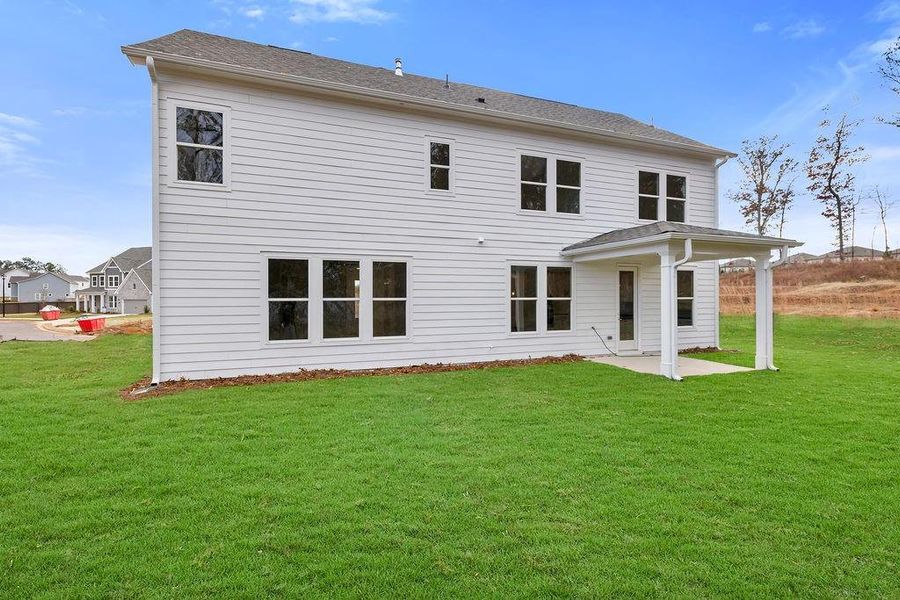 Exterior details and patio area of a home in Maddox Landing, Hoschton (Image 19).