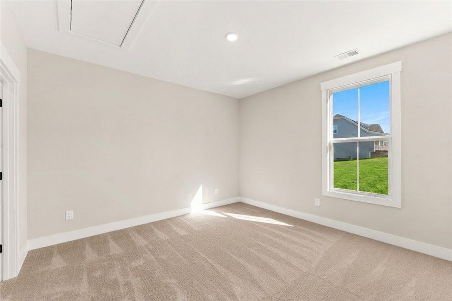 This bright and airy room offers a versatile space
