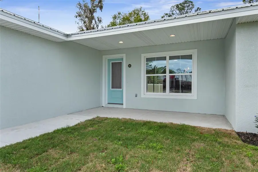 Exterior details and patio area of a home in , Bunnell (Image 3).