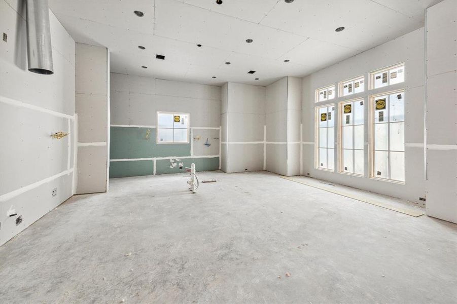 This chef's kitchen filled with warm, natural light will be the heart of the home.  Construction as of 10/29