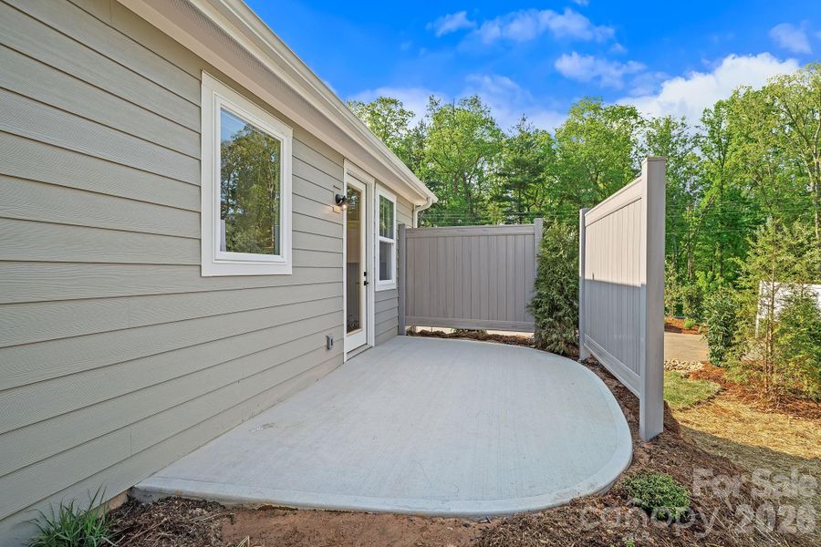 Exterior details and patio area of a home in , Arden (Image 4).