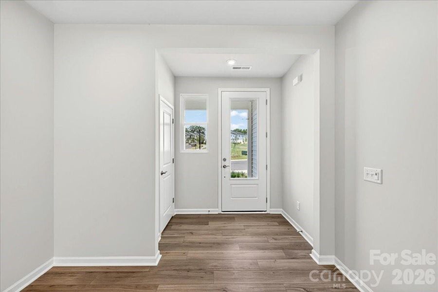 Foyer with a powder room Foyer with a powder room