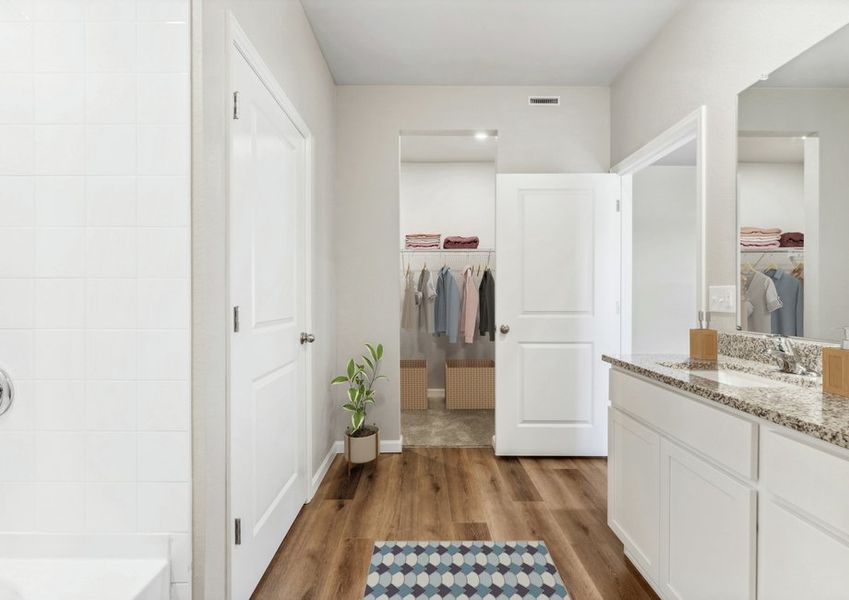 The master bathroom has a large vanity and a step in shower The master bathroom has a large vanity and a step in shower