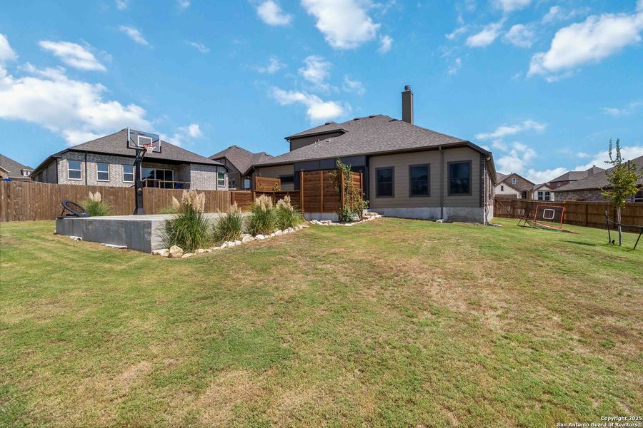 Front exterior of a new home in The Preserve at Singing Hills 50's, Spring Branch, TX, highlighting curb appeal (Image 2).