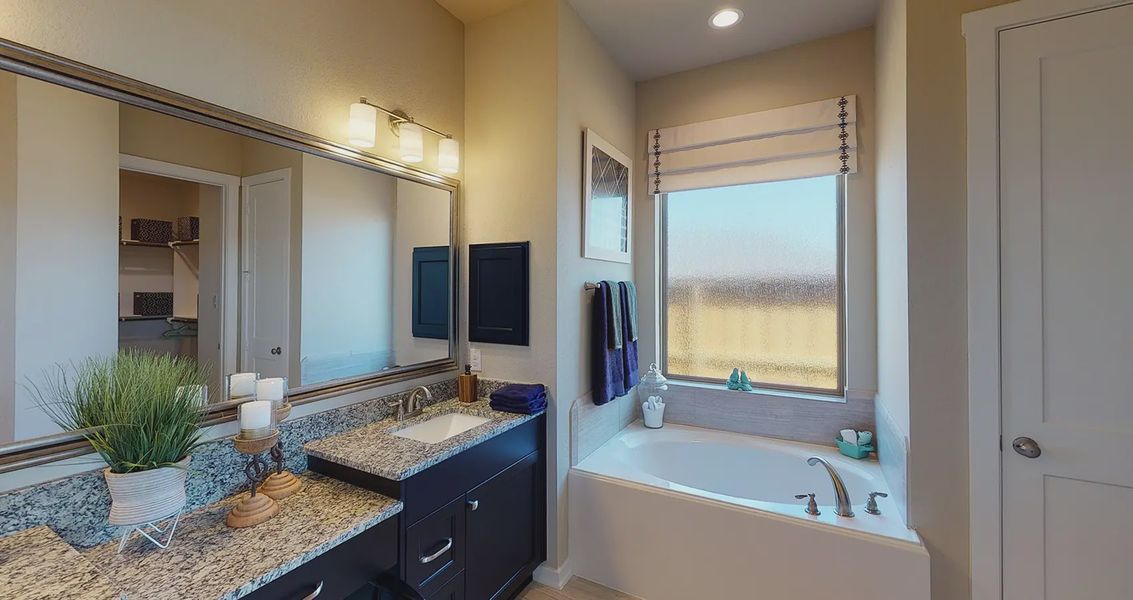 Representative furnished interior of a home built from the Hillcrest by Chesmar Homes in Sienna Chateau, Missouri City (Image 6).