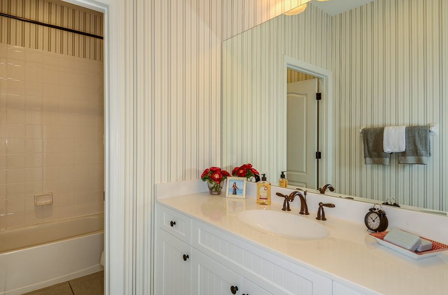 Representative interior finishes for a home built from the Fresh Spring by Neal Communities in SkySail, Naples (Image 12).