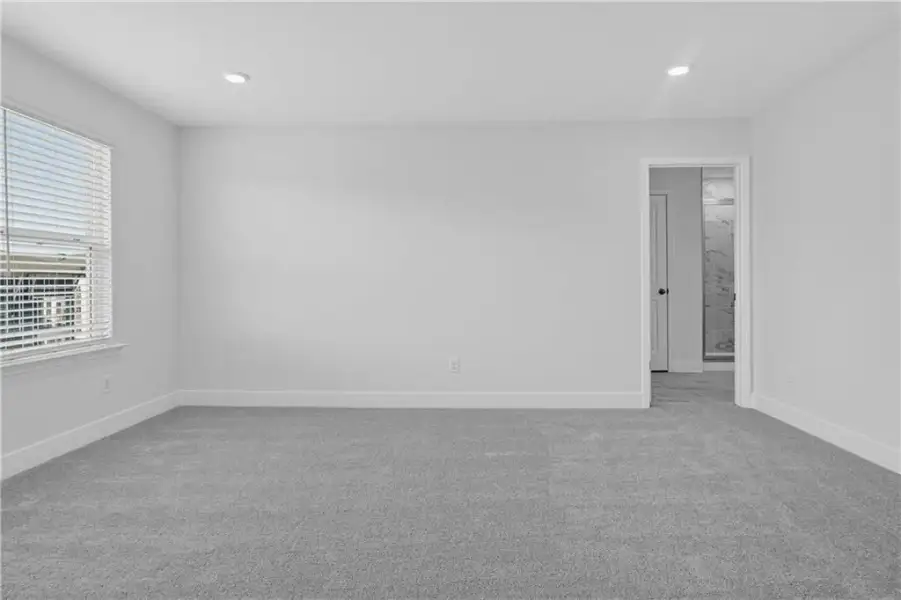 Spacious, unfurnished interior of a new home in Towns at Holly Springs, Holly Springs (Image 27). Spacious, unfurnished interior of a new home in Towns at Holly Springs, Holly Springs (Image 27).