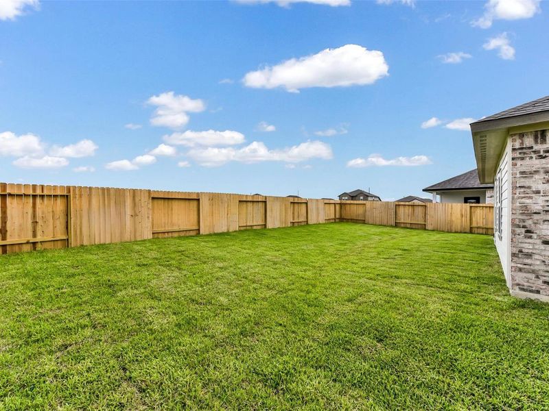 Exterior details and patio area of a home in River Ranch Meadows, Dayton (Image 23). Exterior details and patio area of a home in River Ranch Meadows, Dayton (Image 23).