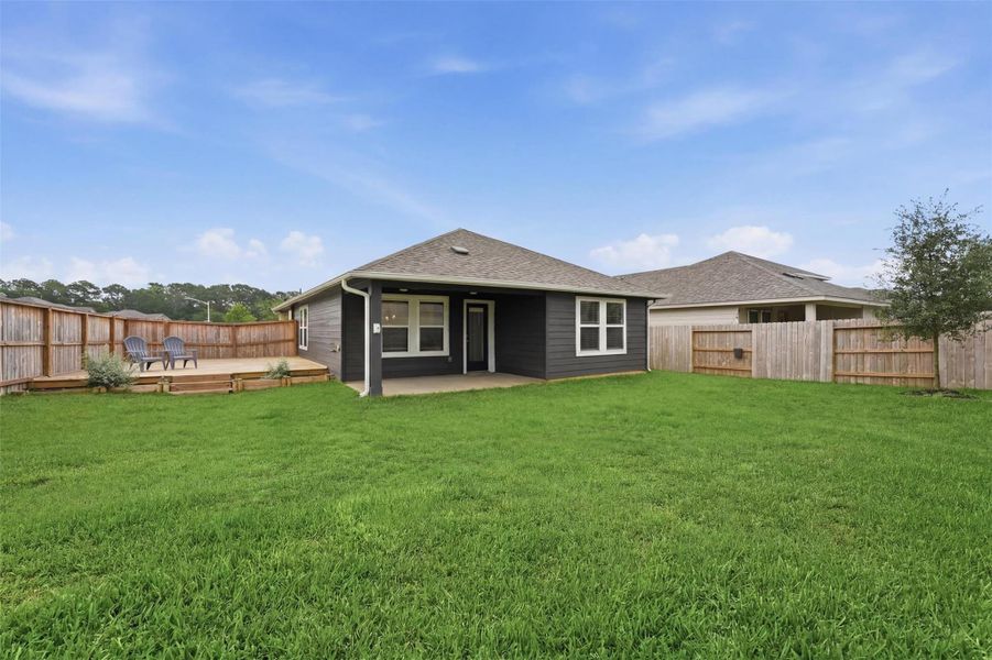 Backyard ready to Grill and Chill! Covered back patio with a large deck built in the side yard. Being on the corner lot has its perks and space is just 1! Backyard ready to Grill and Chill! Covered back patio with a large deck built in the side yard. Being on the corner lot has its perks and space is just 1!