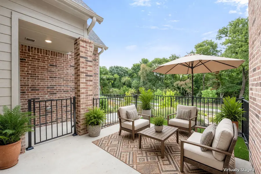 Exterior details and patio area of a home in Cottonwood Creek, Rowlett (Image 4).