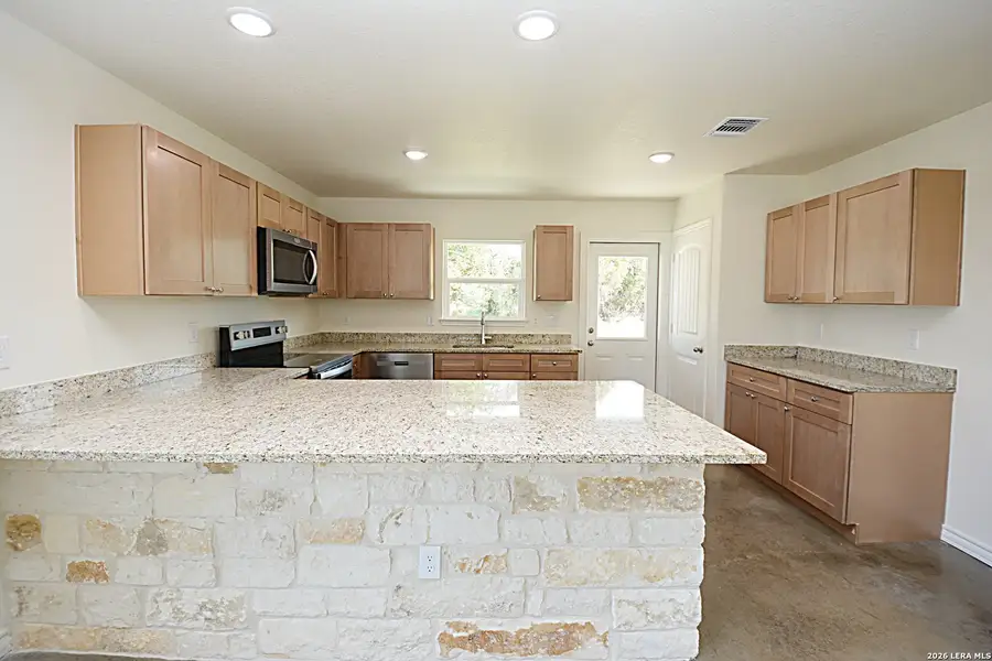 Furnished interior view inside a new home in , Spring Branch (Image 3). Furnished interior view inside a new home in , Spring Branch (Image 3).