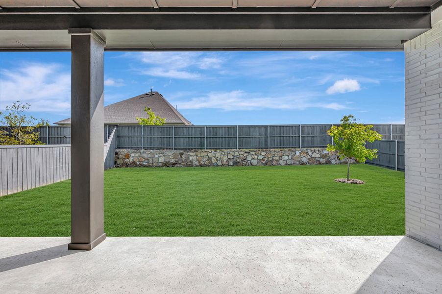 Exterior details and patio area of a home in Goodland – Manor Series, Grand Prairie (Image 4). Exterior details and patio area of a home in Goodland – Manor Series, Grand Prairie (Image 4).