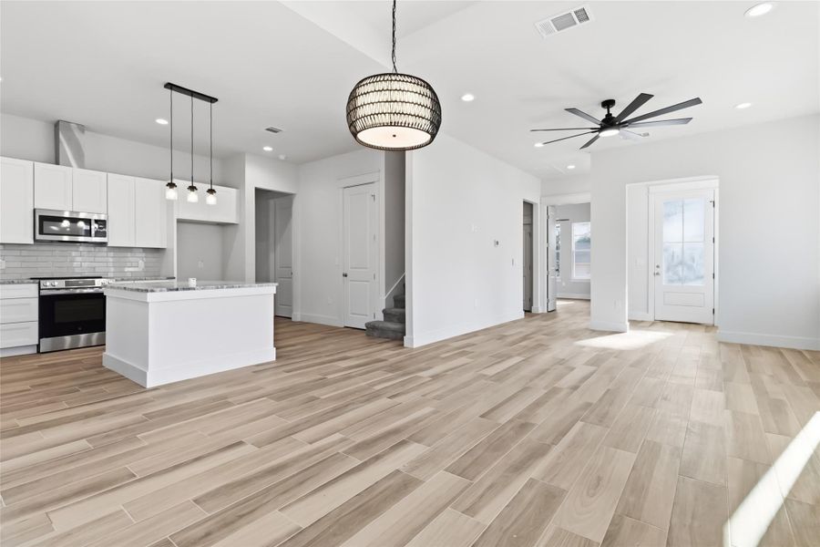 Dining area with views of the kitchen and living area