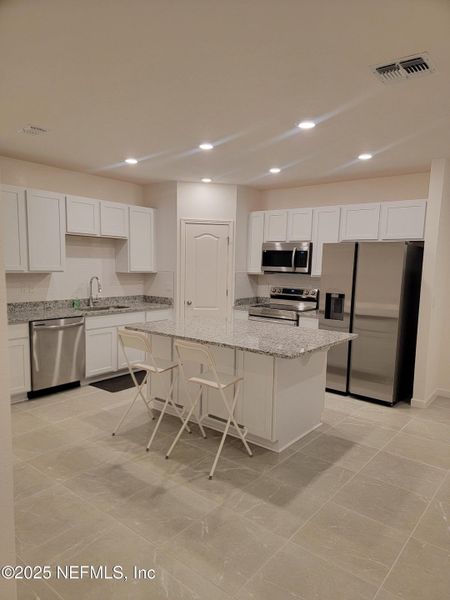 Furnished interior view inside a new home in , Jacksonville (Image 3).