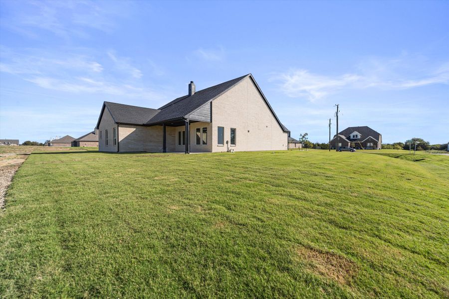 Exterior details and patio area of a home in Fannin Ranch, Leonard (Image 25).