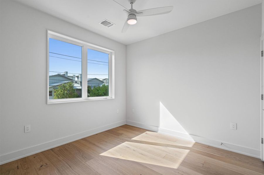 The second bedroom on the second level featuers a walk in closet. The second bedroom on the second level featuers a walk in closet.