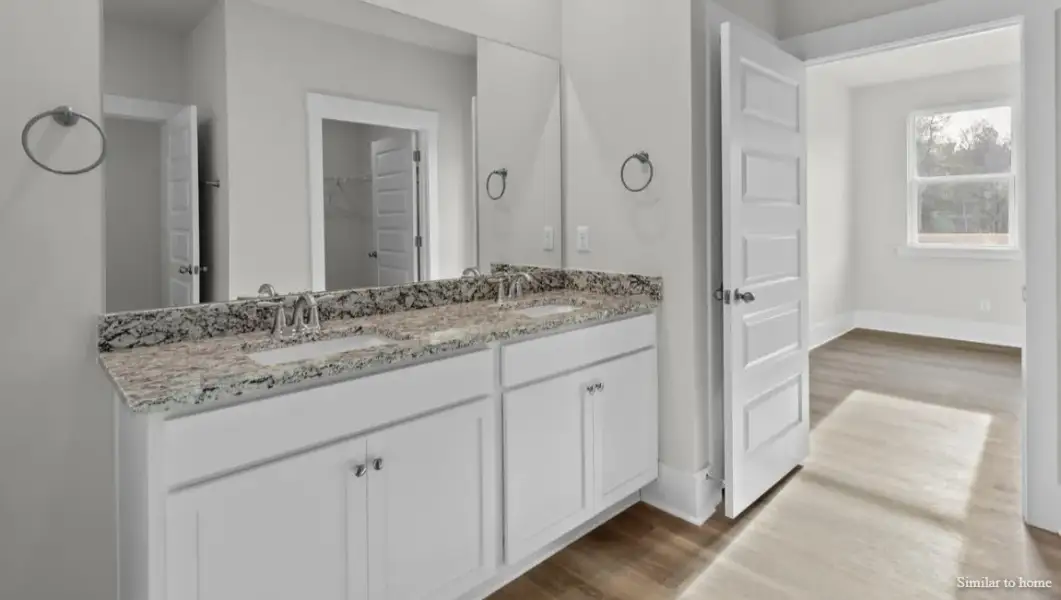 Furnished interior view inside a new home in The Highlands at Cedar Hill Landing, Navassa (Image 13).