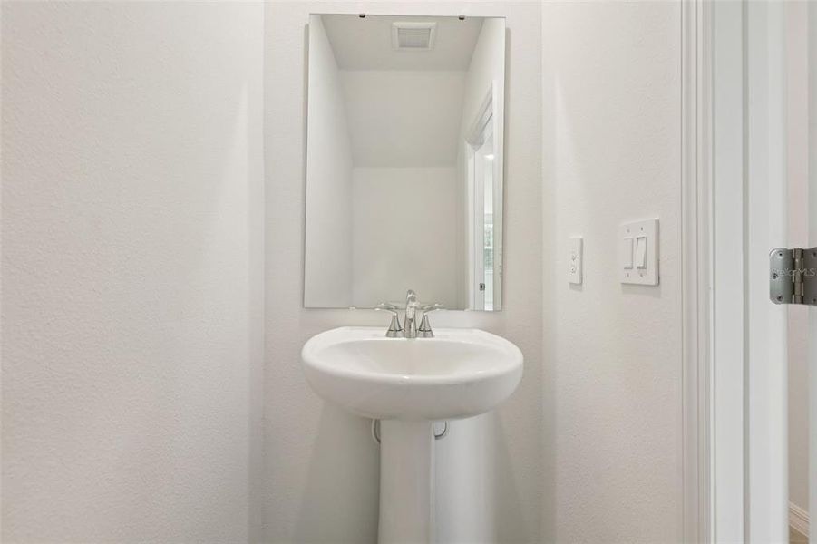 Close-up of interior finishes inside a home in Cagan Crossings West, Clermont (Image 18).