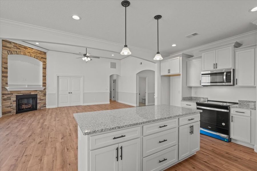 Representative furnished interior of a home built from the Converse by Enchanted Homes in Lonesome Dove, San Antonio (Image 7).