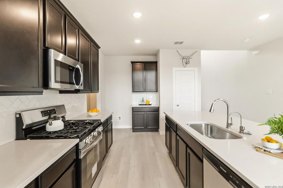 Furnished interior view inside a new home in Hickory Ridge, Elmendorf (Image 17).