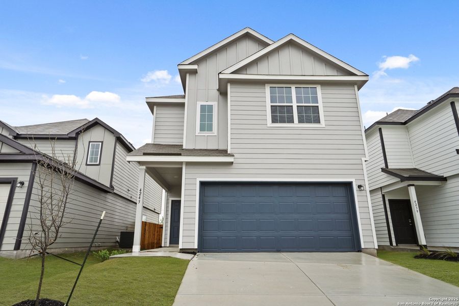 Front exterior of a new home in Melissa Ranch, San Antonio, TX, highlighting curb appeal (Image 12).