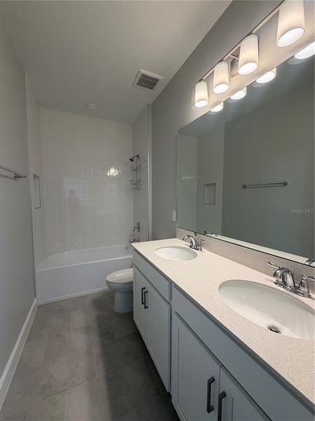 Furnished interior view inside a new home in Center Lake on the Park, St. Cloud (Image 10).