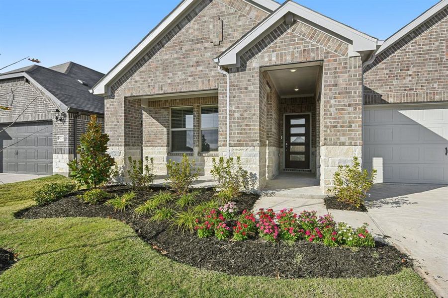 Exterior details and patio area of a home in Lakehaven - Signature Series, Farmersville (Image 2). Exterior details and patio area of a home in Lakehaven - Signature Series, Farmersville (Image 2).