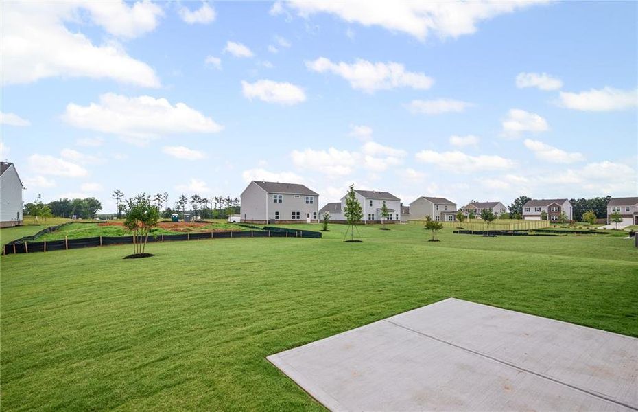 Front exterior of a new home in Anderson Point, McDonough, GA, highlighting curb appeal (Image 13).